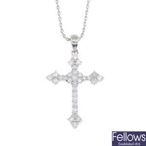 A brilliant-cut diamond cross pendant, with chain.