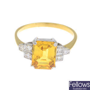 A yellow sapphire and brilliant-cut diamond dress ring.