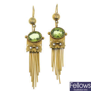 A pair of peridot earrings.