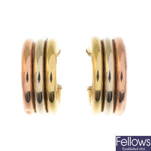 A pair of 9ct gold tri-colour hoop earrings.
