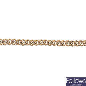 An early 20th century 9ct gold fancy-link chain, with hoop-link terminals.