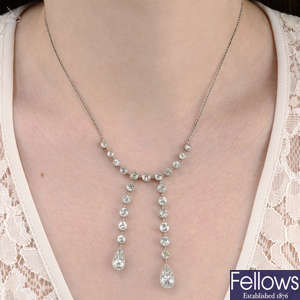 An early 20th century old-cut diamond negligee pendant, on chain.