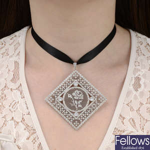 An openwork brilliant-cut diamond lattice pendant.