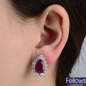 A pair of ruby and vari-cut diamond cluster earrings.
