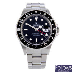 ROLEX - a gentleman's stainless steel Oyster Perpetual Date GMT Master II bracelet watch.