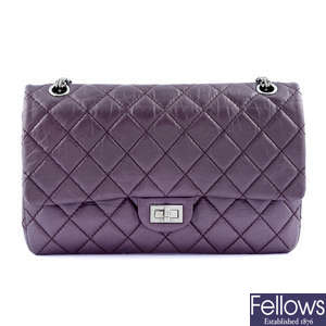 CHANEL - a purple 2.55 Reissue 226 handbag.