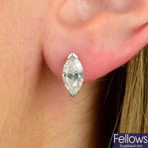 A pair of 18ct gold marquise-shape diamond stud earrings.