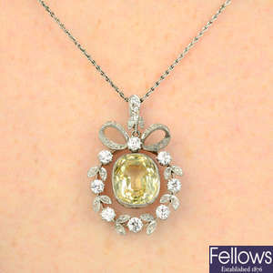 An early 20th century platinum Sri Lankan sapphire and diamond pendant, with chain.