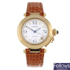 CARTIER - an 18ct yellow gold Pasha wrist watch.