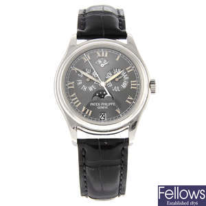 PATEK PHILIPPE - a gentleman's platinum Annual Calendar wrist watch.