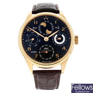 IWC - a gentleman's 18ct rose gold Portuguese Perpetual Calendar Double Moon wrist watch.