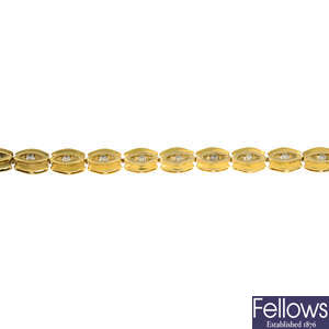 A 9ct gold brown diamond bracelet.