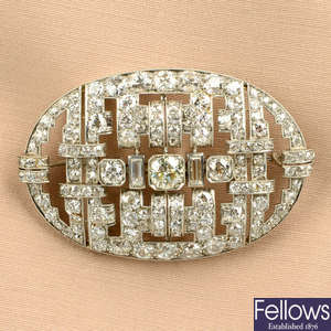 An Art Deco old-cut diamond geometric brooch, with baguette-cut diamond accents.