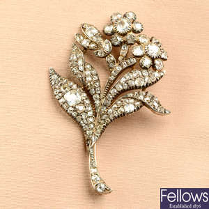 A late 19th century silver and gold old-cut diamond floral brooch.