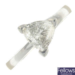 A triangular-shape diamond single-stone ring.