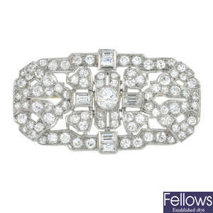 An Art Deco platinum old-cut and rectangular-shape diamond geometric brooch.