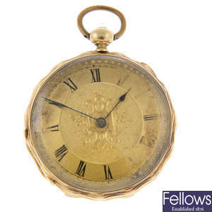 A yellow metal open face pocket watch.