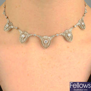 An Art Deco platinum diamond fringe necklace.