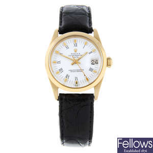 ROLEX – a mid-size 18ct yellow gold Oyster Perpetual Date wrist watch.