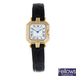 CARTIER - a lady's 18ct gold wrist watch.