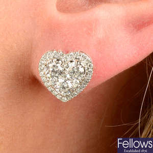 A pair of 18ct gold brilliant-cut diamond heart-shape cluster earrings.