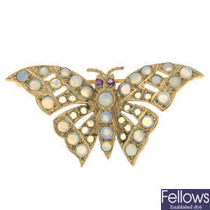 A 9ct gold opal and ruby butterfly brooch.