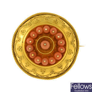 A  late 19th century gold coral brooch.