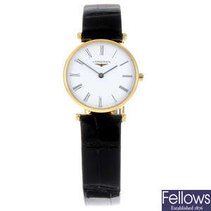 CURRENT MODEL: LONGINES - a lady's gold plated La Grande Classique wrist watch.