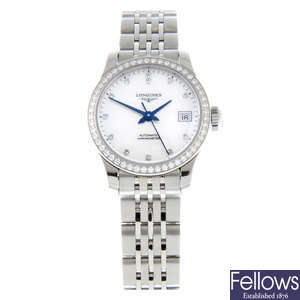 CURRENT MODEL: LONGINES - a stainless steel Record bracelet watch, 26mm.