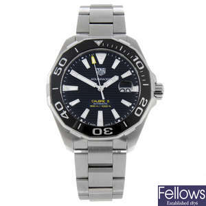 CURRENT MODEL: TAG HEUER - a gentleman's stainless steel Aquaracer Calibre 5 bracelet watch, 44mm.