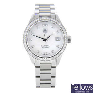 CURRENT MODEL: TAG HEUER - a lady's stainless steel Carrera bracelet watch.