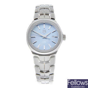 CURRENT MODEL: TAG HEUER - a lady's stainless steel Link bracelet watch.