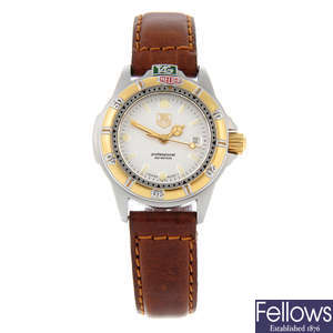 TAG HEUER - a lady's bi-colour 4000 Series wrist watch.