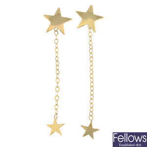 A pair of star drop earrings.