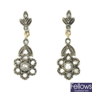 A pair of rose-cut diamond drop earrings.