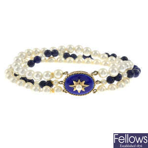 A three-row cultured pearl and lapis lazuli bracelet, with a 9ct gold enamel clasp.