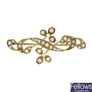 An early 20th century 15ct gold split pearl floral brooch.