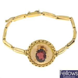 A 9ct gold garnet set bracelet.
