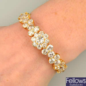 An old-cut diamond floral cluster bangle.