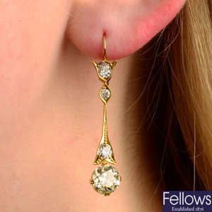 A pair of old-cut diamond drop earrings.