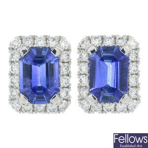 A pair of sapphire and diamond cluster stud earrings.