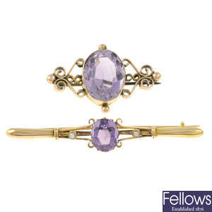A 9ct gold amethyst and split pearl brooch and a further amethyst brooch.