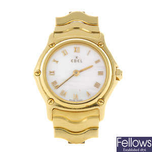 EBEL - a lady's 18ct yellow gold Classic Wave bracelet watch.