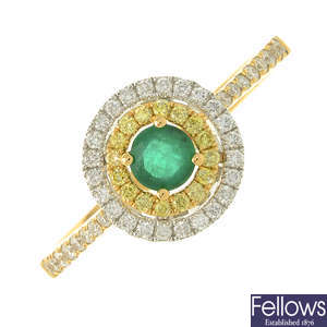 An 18ct gold emerald, diamond and coloured diamond dress ring.