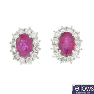 A pair of 18ct gold ruby and diamond cluster earrings. 
