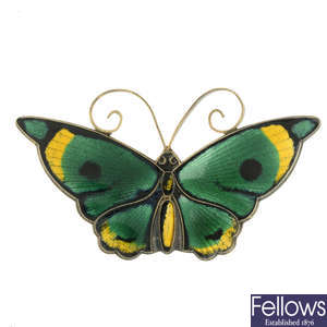 An enamel brooch of a butterfly, by David Anderson.