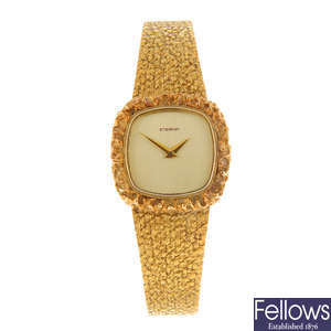 ETERNA - a lady's yellow metal bracelet watch.