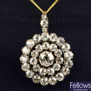 A late Victorian silver and gold old-cut diamond cluster pendant.