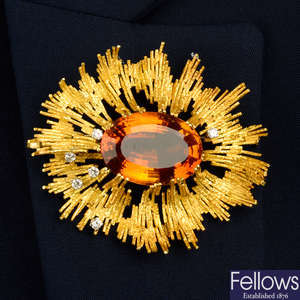 A mid 20th century 18ct gold citrine and diamond abstract pendant/brooch, by Andrew Grima.