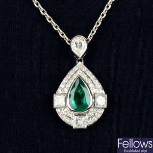 An 18ct gold emerald and diamond pendant, on chain.